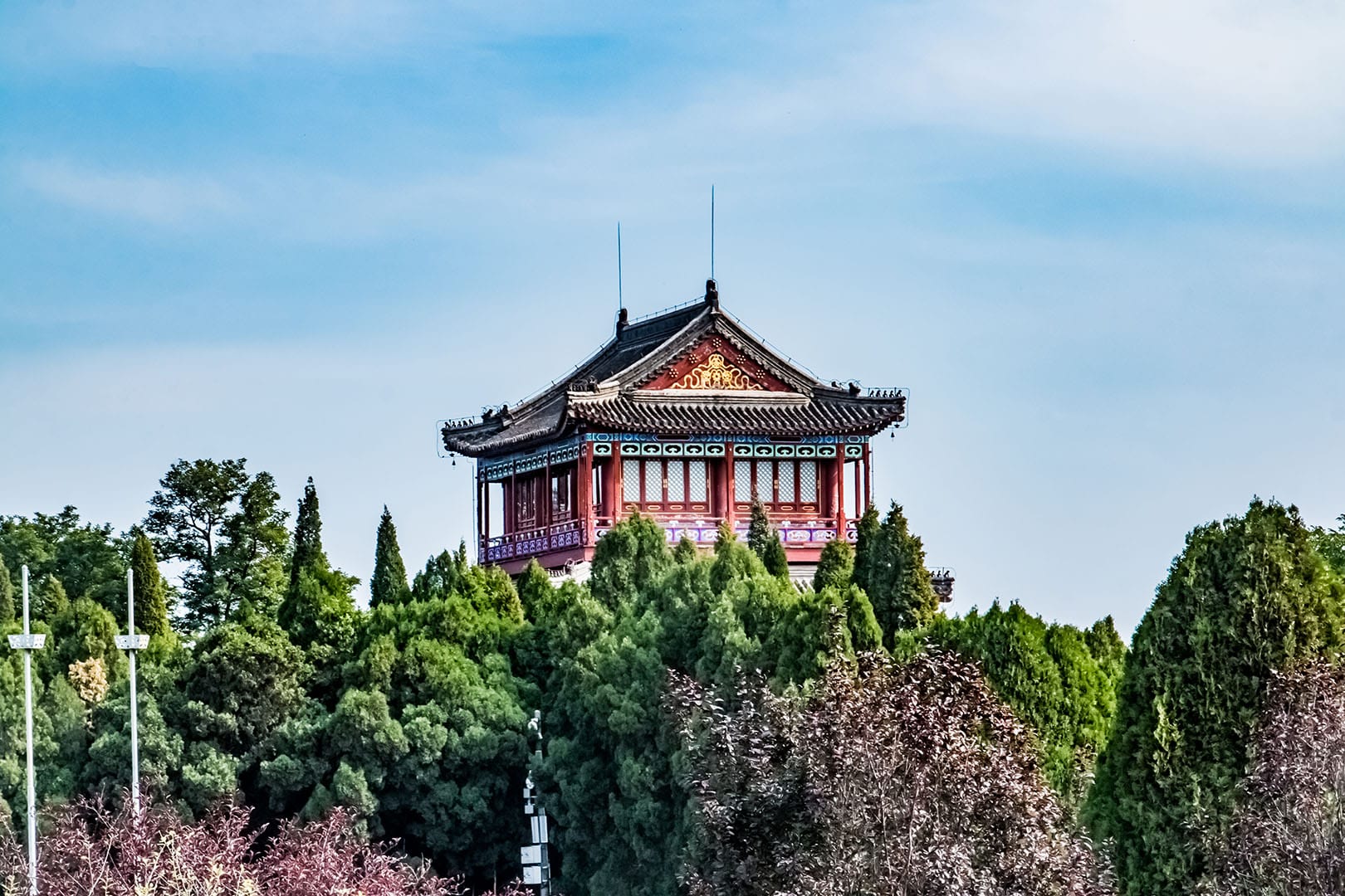Traditional Chinese architecture with courtyard entrance and red doors, representing the Qinhuangdao case study on Russia-Promo