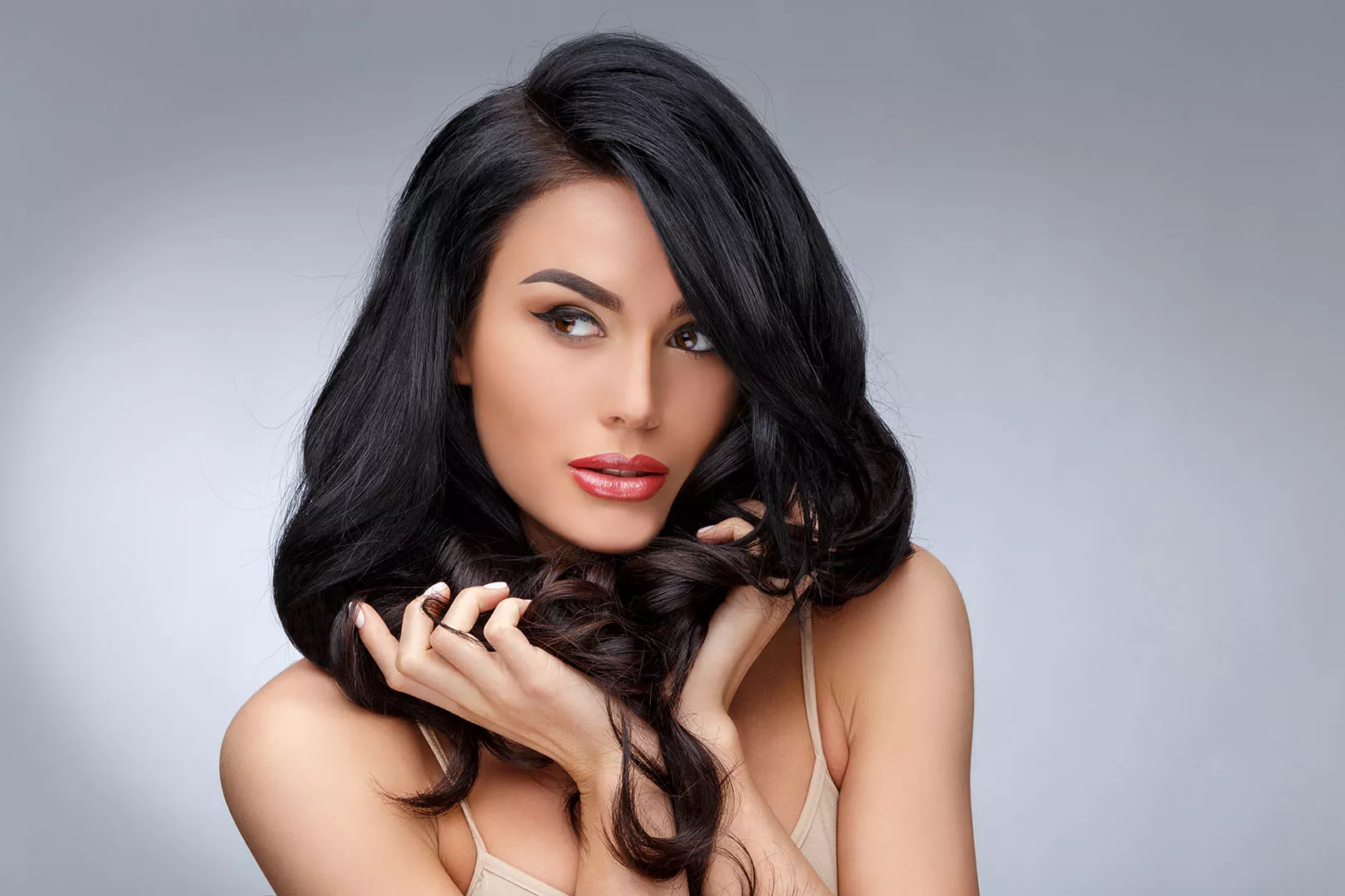Trichup case study image featuring a woman with beautiful, voluminous black hair, highlighting the brand's focus on hair care.